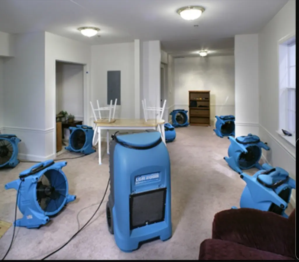 Air movers and dehumidifier setup for Water Damage Restoration in East Goshen